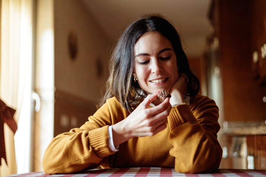 Woman eating small snack